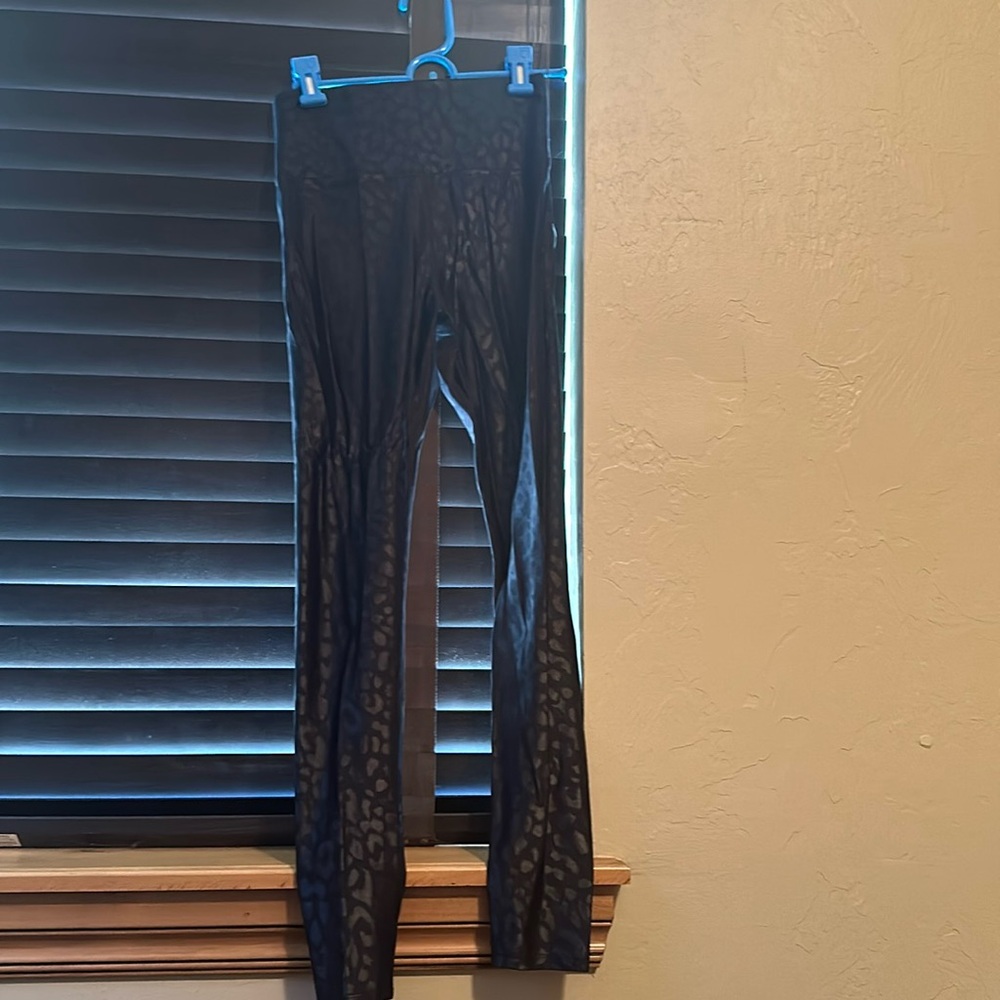 Carbon workout tights. Small leopard print pants.